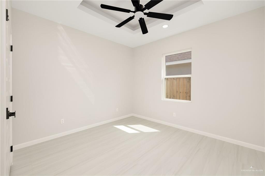 9119 North 25th Street McAllen, TX 78504 - Photo 21 of 22 a view of an empty room with a window