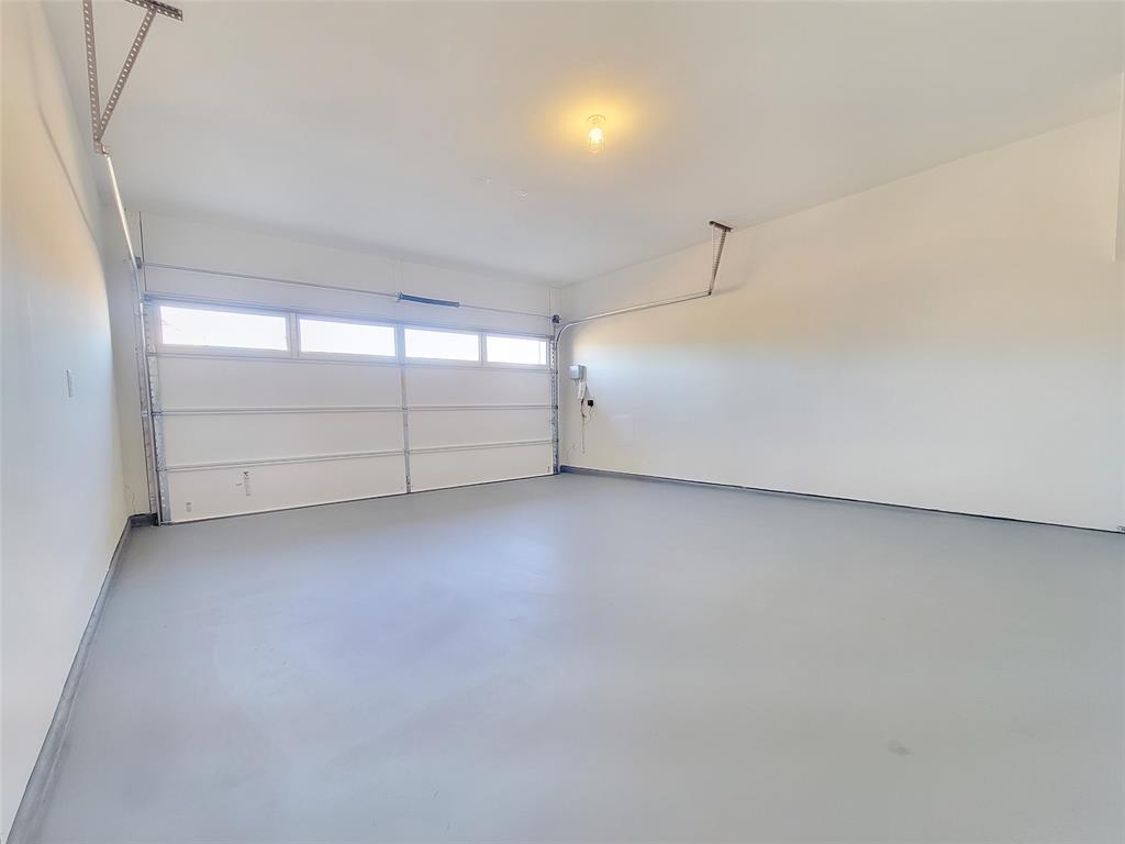 2032 Bobtail Pass Leander, TX 78641 - Photo 16 of 18 a view of a garage