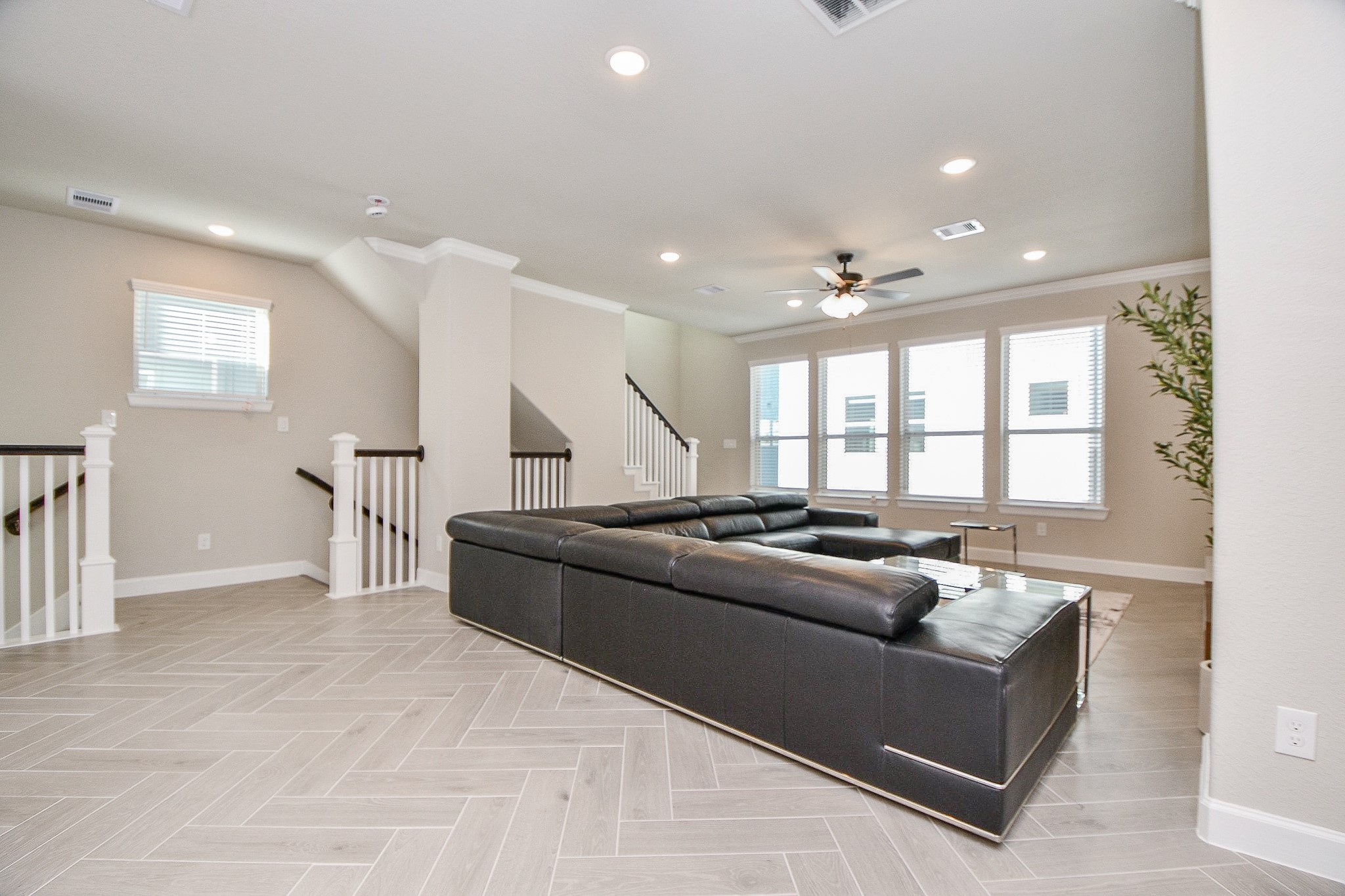 a living room with furniture and window