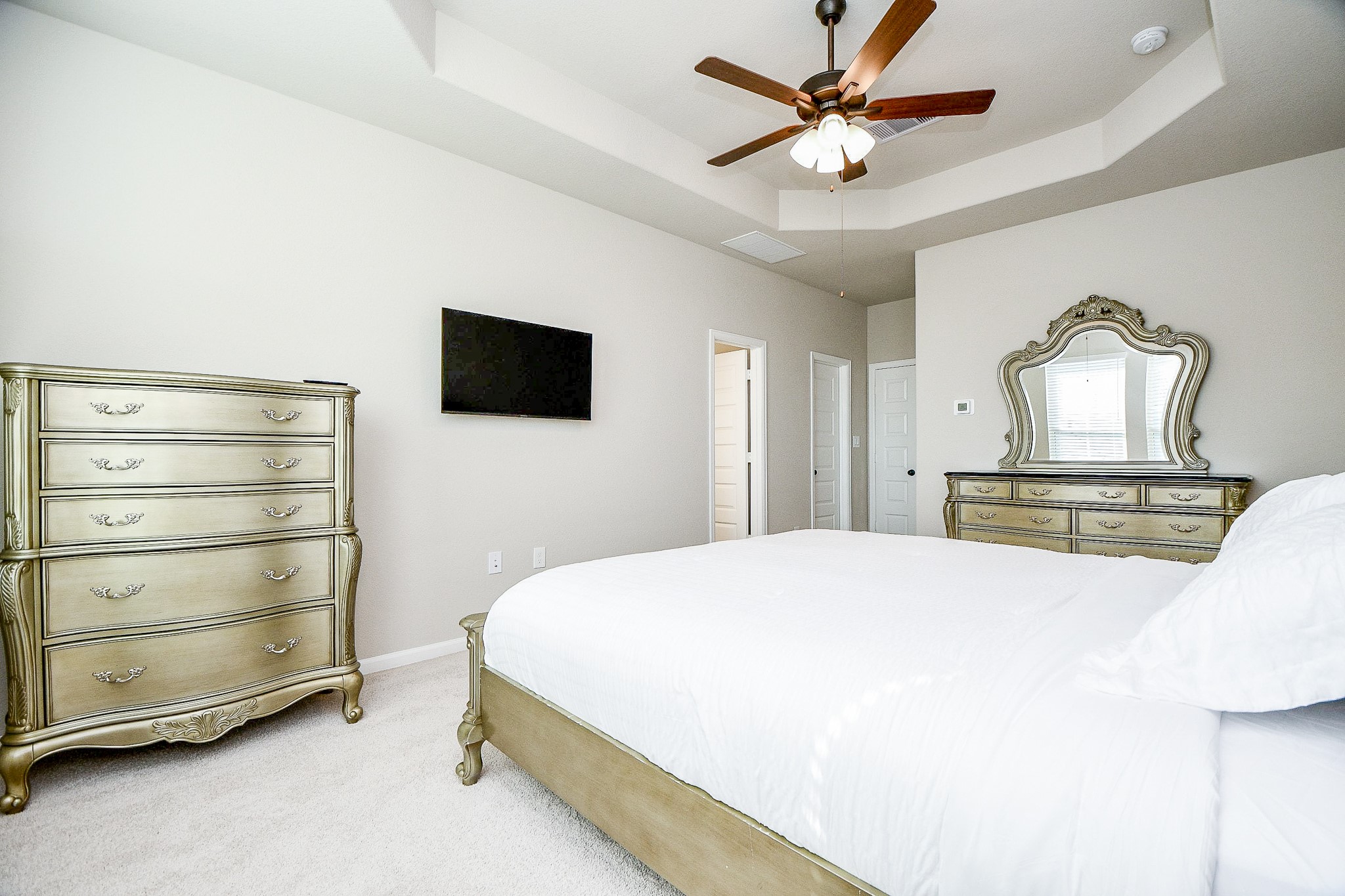 2033 Millbridge Spring Lane Houston, TX 77051 - Photo 4 of 15 a bedroom with a bed and a flat screen tv