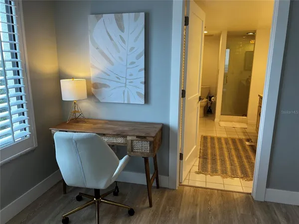 a large bathroom with a double vanity sink and a mirror