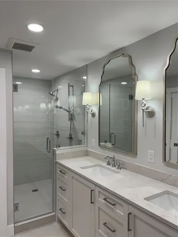 a bedroom with bed and window