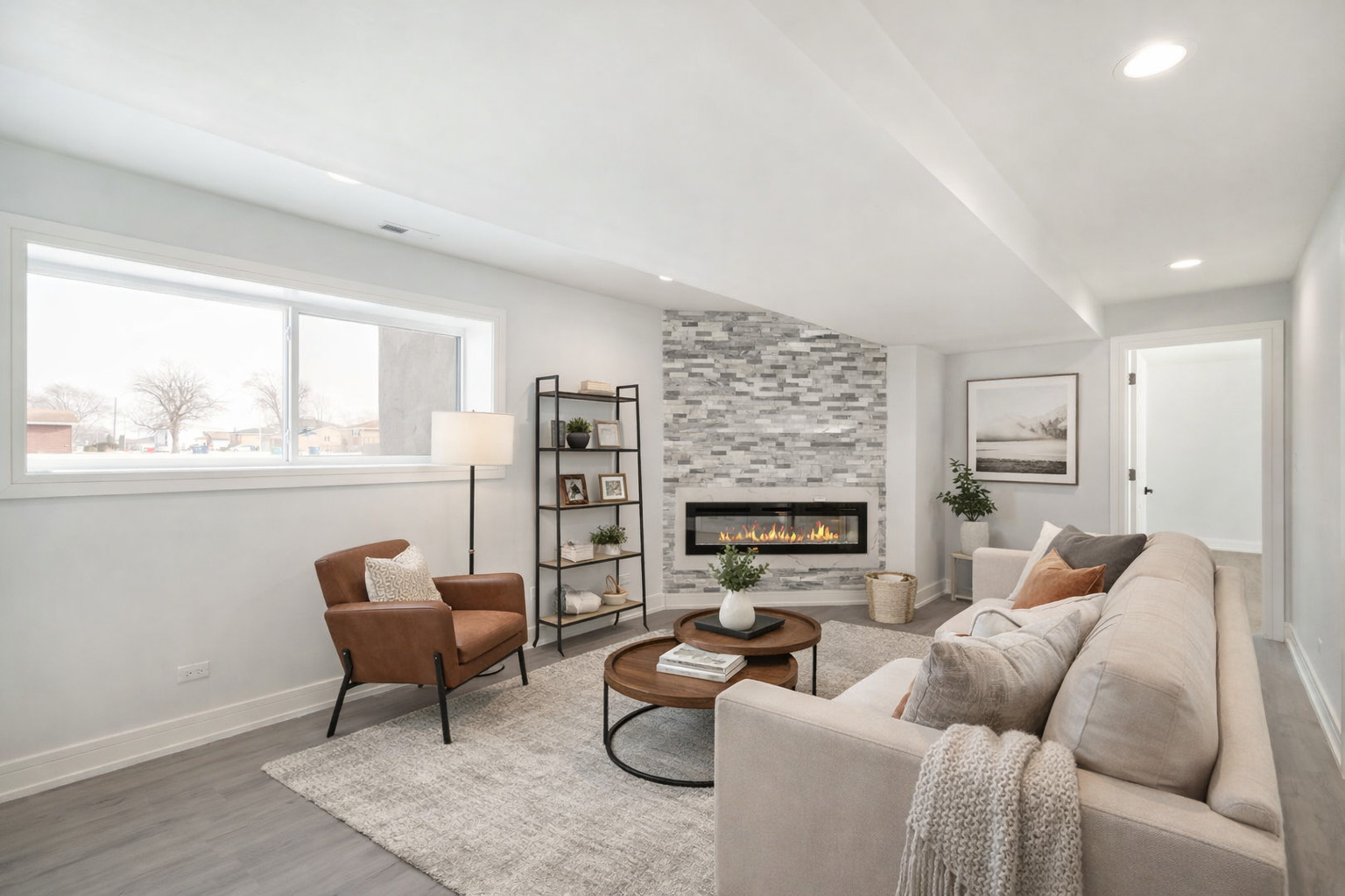 718 East 152nd Street Harvey, IL 60426 - Photo 16 of 33 a living room with furniture a fireplace and a large window