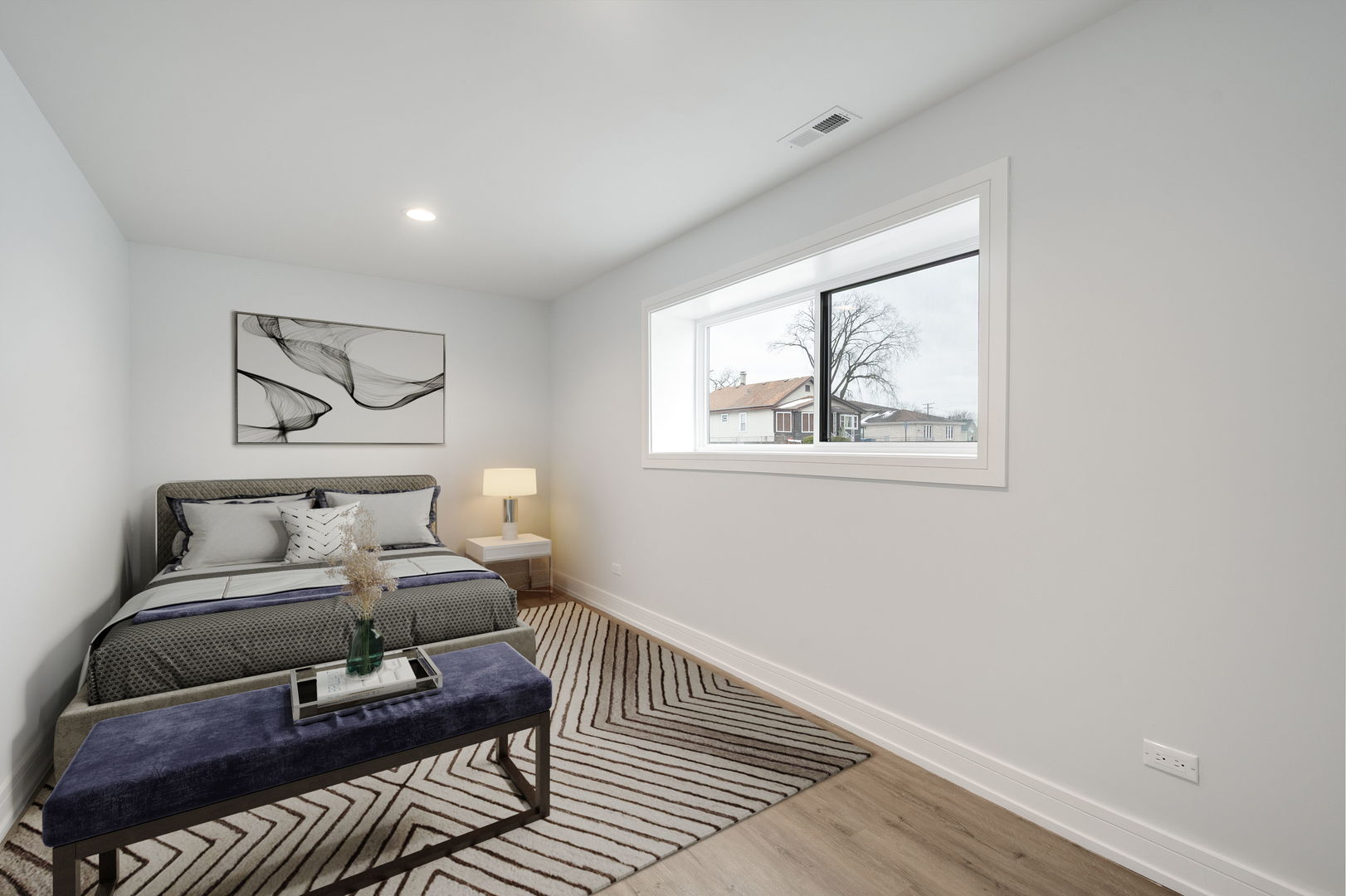 718 East 152nd Street Harvey, IL 60426 - Photo 20 of 33 a bedroom with a bed and wooden floor