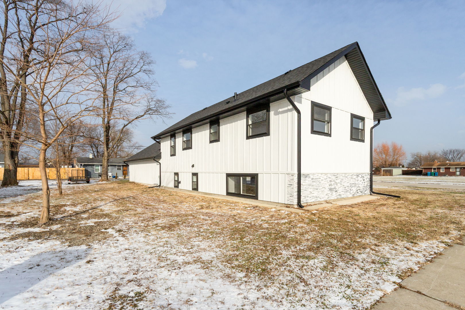 718 East 152nd Street Harvey, IL 60426 - Photo 23 of 33 a view of a house with snow on the road