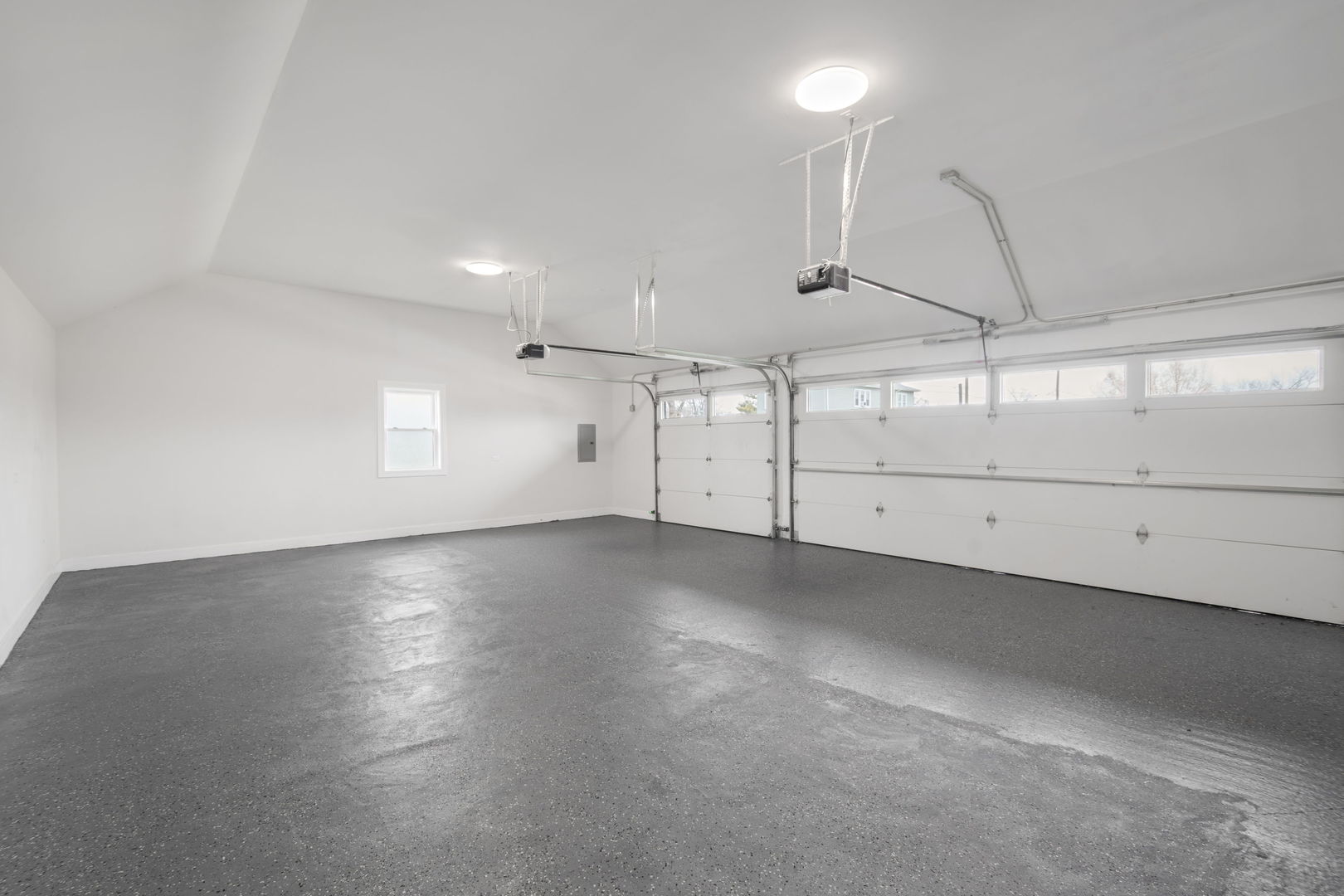 718 East 152nd Street Harvey, IL 60426 - Photo 27 of 33 an empty room with chandelier and windows