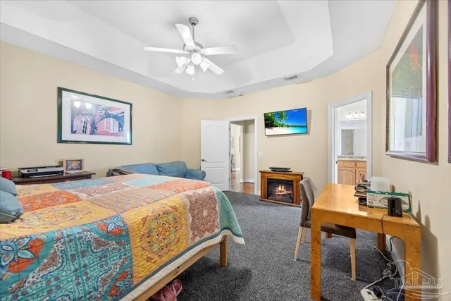 a bed room with a bed and a couch