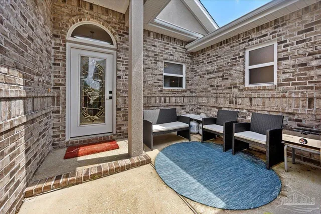 a building outdoor space with patio furniture