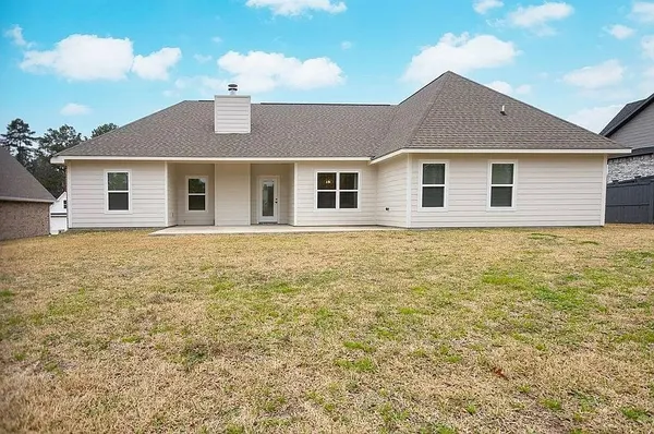a front view of a house with yard