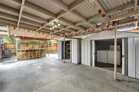 a view of a room with wooden walls