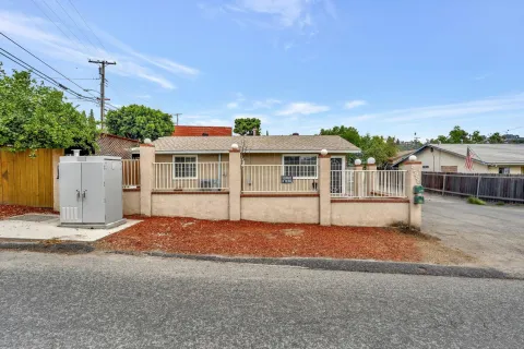 a house with trees in the background