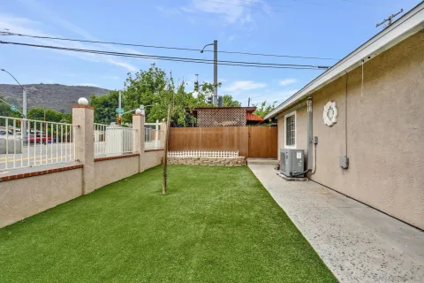 a house view with a garden space