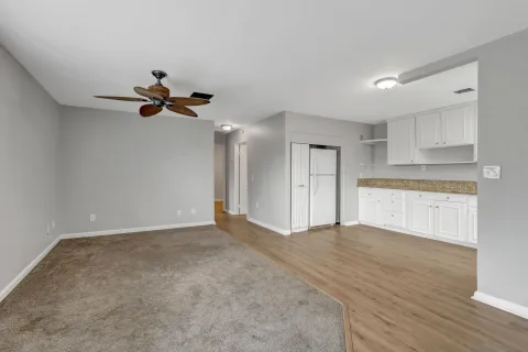 a view of an empty room with a window