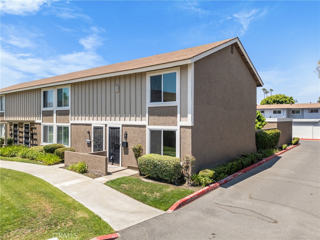 front view of a house with a yard