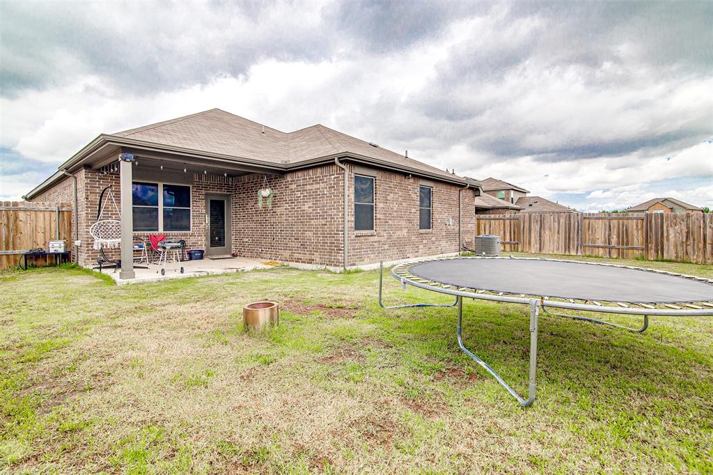 1813 Rialto Lane Crowley, TX 76036 - Photo 26 of 27 a house view with swimming pool and porch