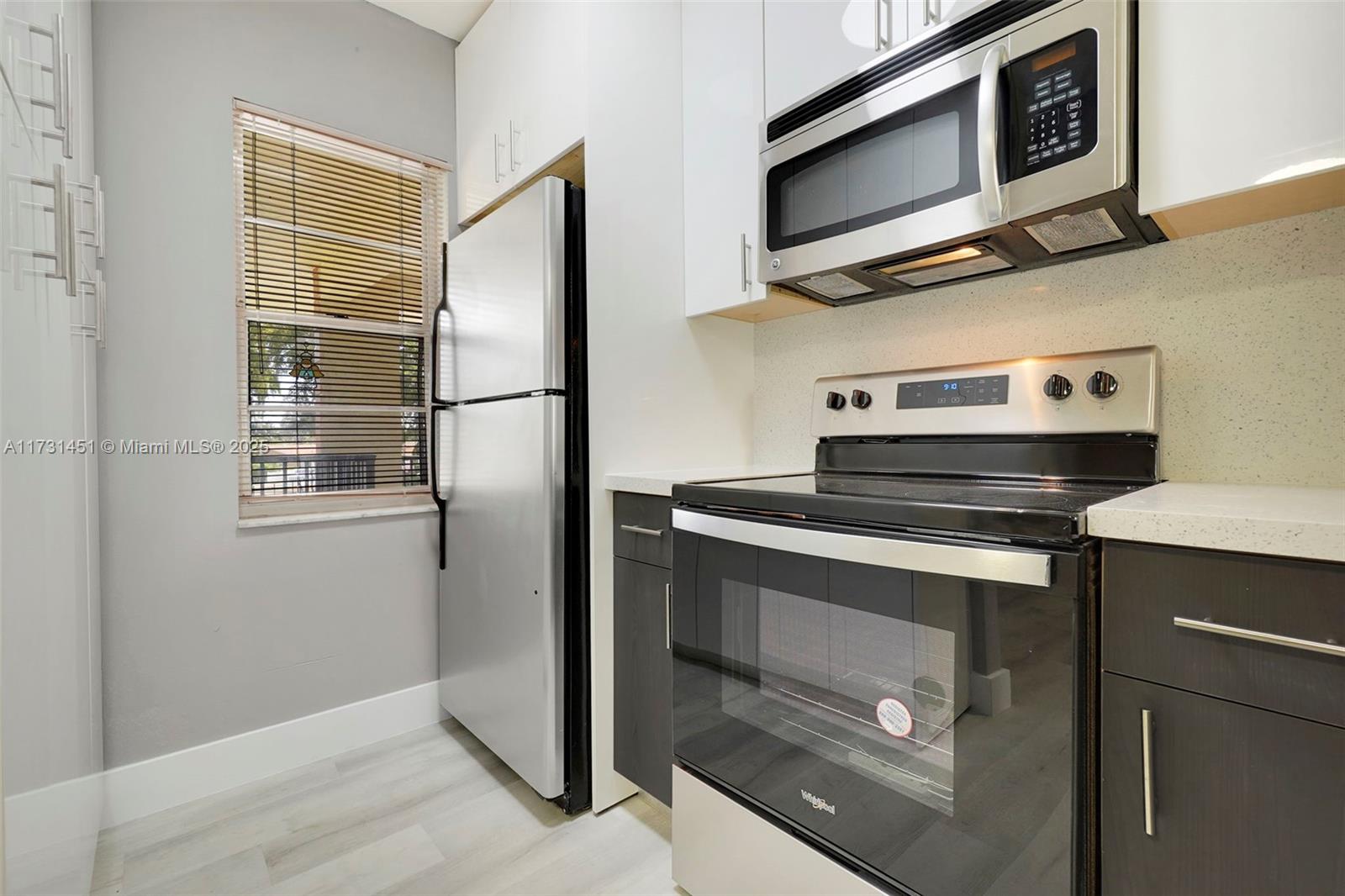 9849 Three Lakes Circle, Unit 1H Boca Raton, FL 33428 - Photo 24 of 25 Gallery Image 24