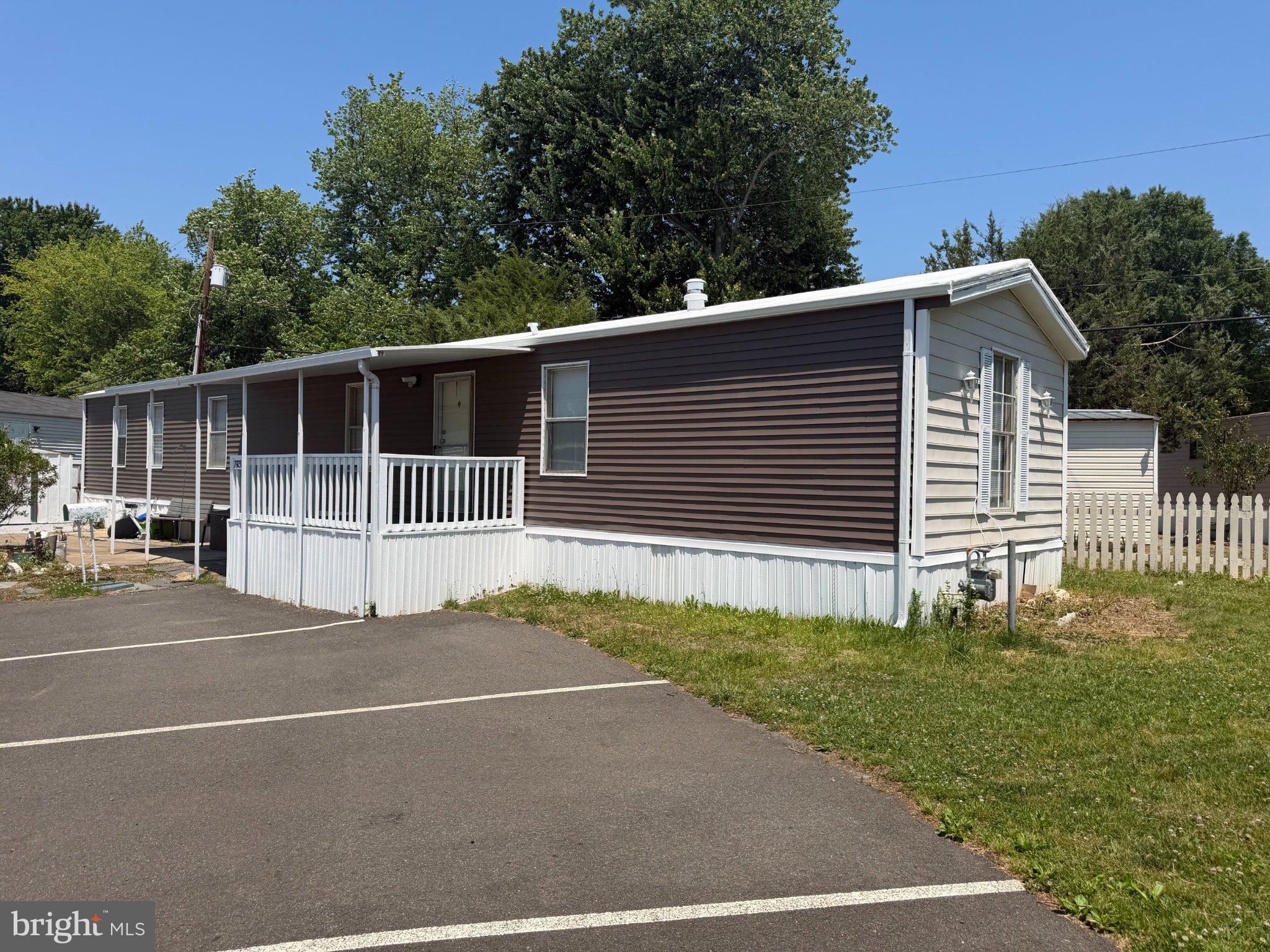 7923 Stork Road Alexandria, VA 22306 - Photo 1 of 17 Charming mobile home with green surroundings.
