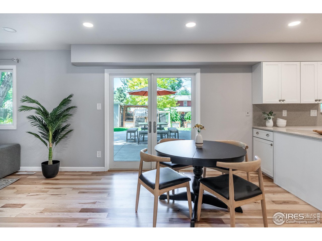 7357 Glacier View Road Longmont, CO 80503 - Photo 11 of 39 a view of a dining room with furniture and window