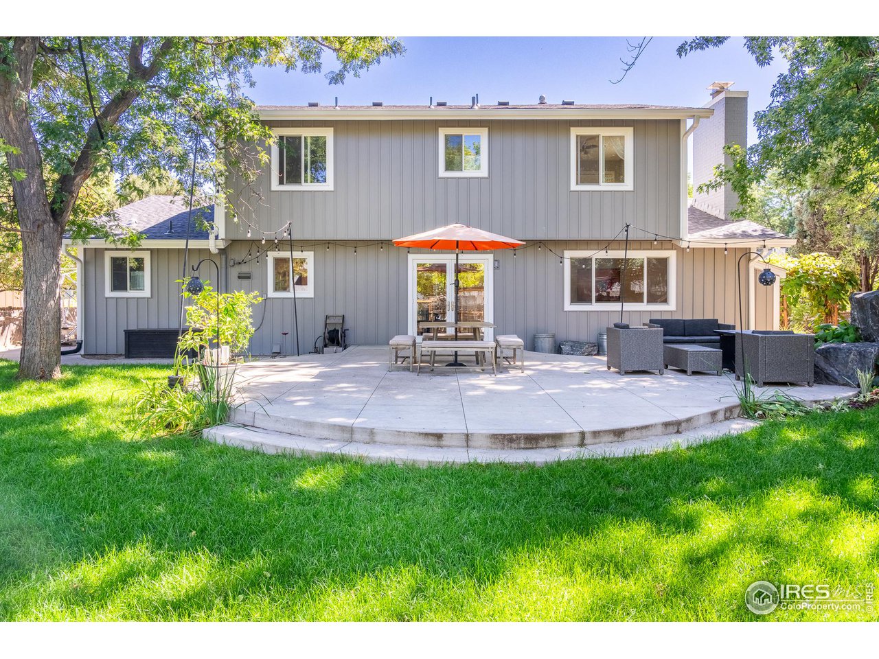 7357 Glacier View Road Longmont, CO 80503 - Photo 32 of 39 a front view of house with yard and outdoor seating