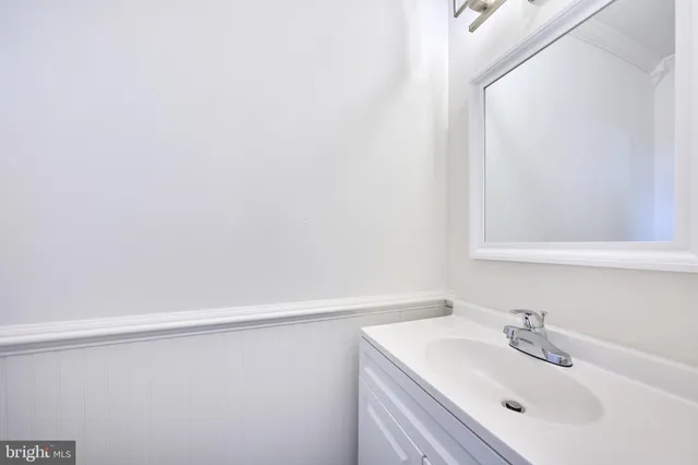 a view of an empty room with glass door