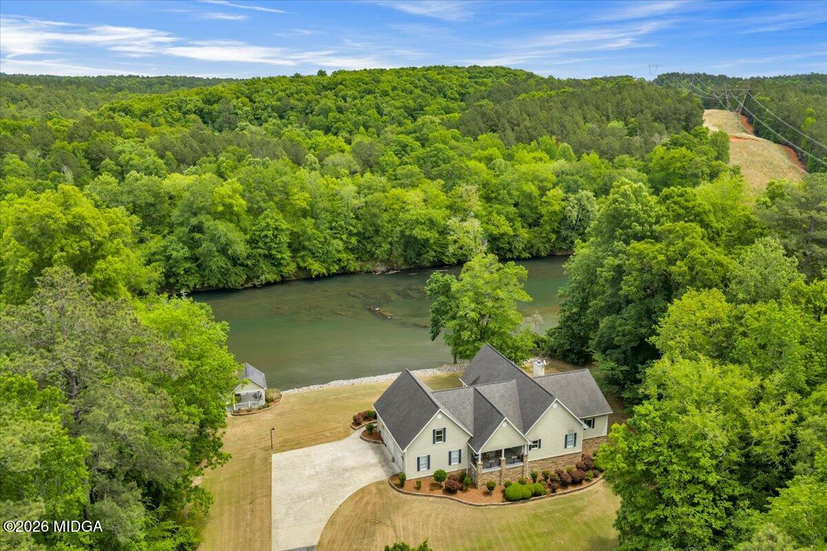 625 Rum Creek Road Juliette, GA 31046 - Photo 19 of 81 an aerial view of a house with a garden and lake view