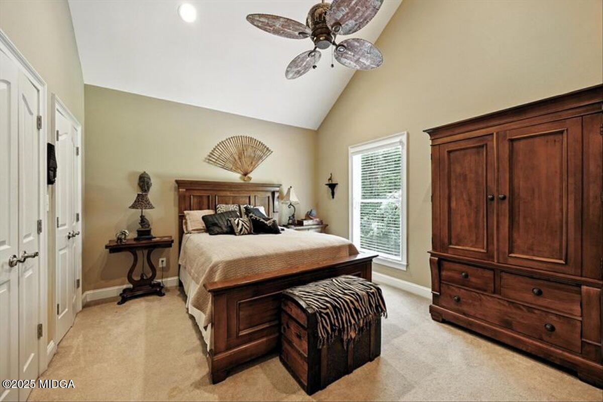 625 Rum Creek Road Juliette, GA 31046 - Photo 44 of 81 a bedroom with a bed and wooden floor