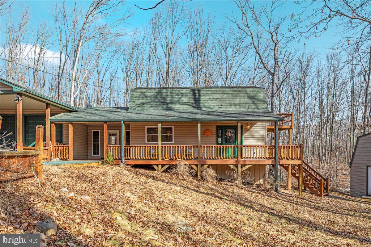 165 Buck Run Delray, WV 26714 - Photo 2 of 23 front view of a house with a patio