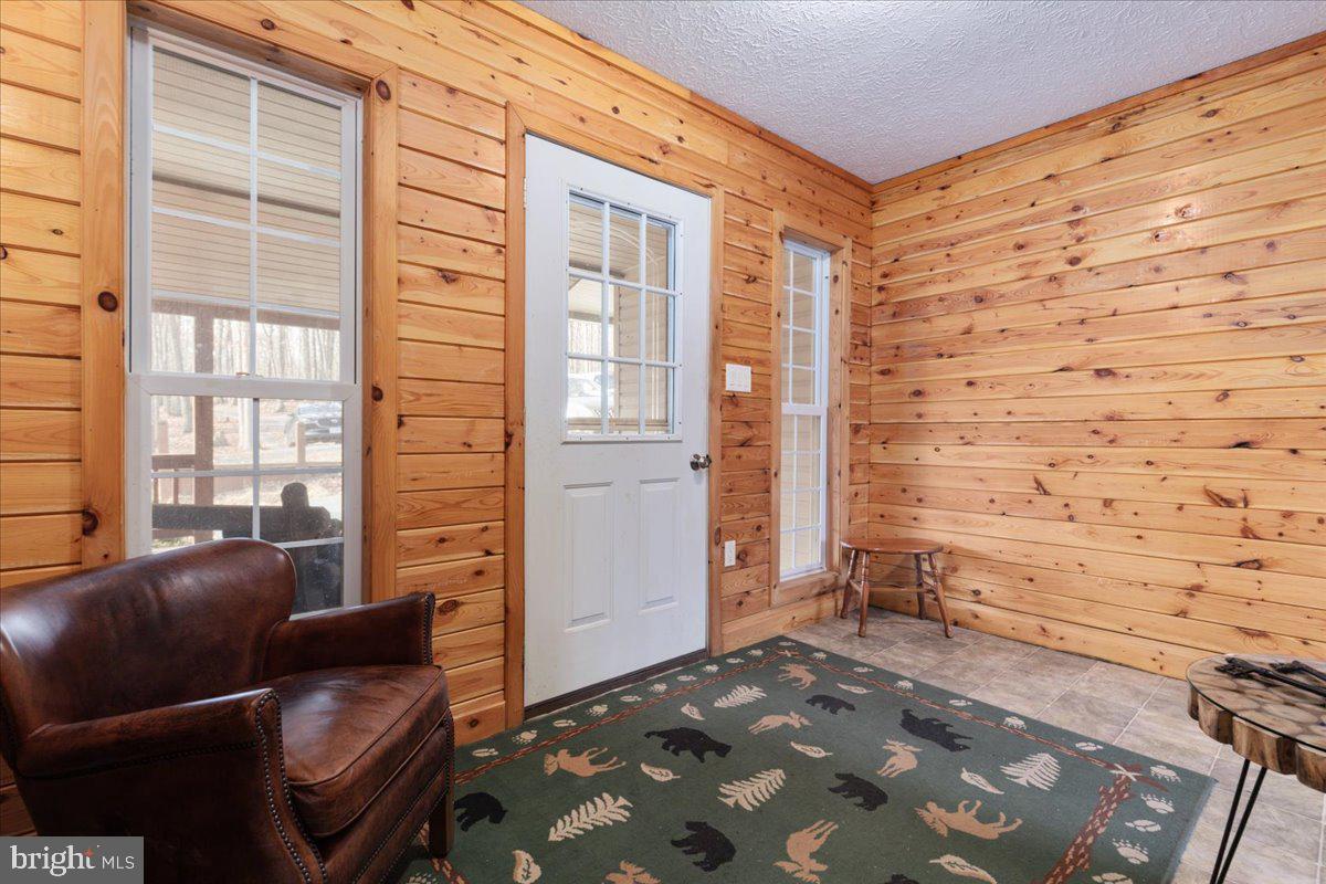 165 Buck Run Delray, WV 26714 - Photo 3 of 23 a living room with furniture and a gate