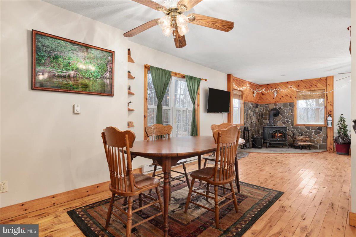 165 Buck Run Delray, WV 26714 - Photo 7 of 23 a view of a dining room with furniture window and wooden floor