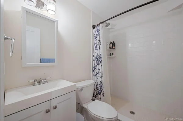 a view of backyard with sitting area and slide