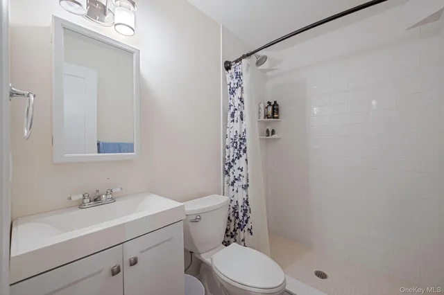 a view of backyard with sitting area and slide