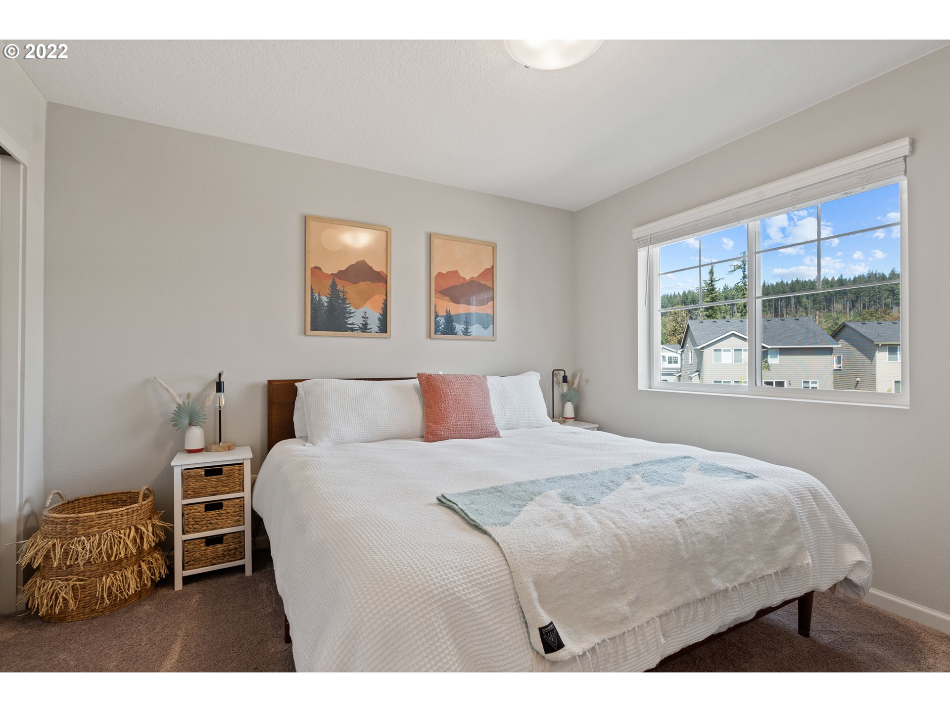 6690 North 89th Loop Camas, WA 98607 - Photo 17 of 24 a bedroom with a bed window and couch