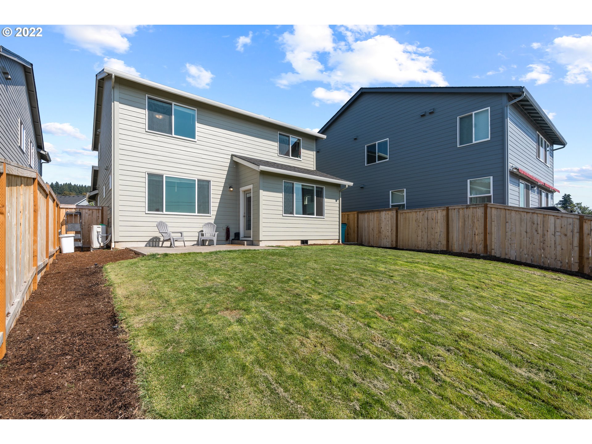 6690 North 89th Loop Camas, WA 98607 - Photo 23 of 24 a house view with a backyard space