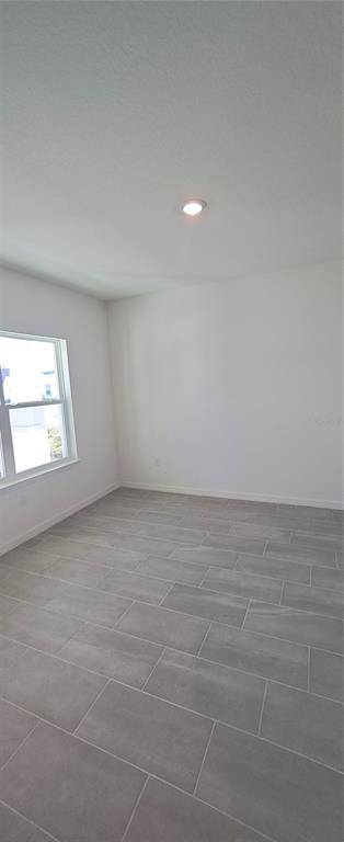 51 Kankakee Trail Palm Coast, FL 32164 - Photo 7 of 14 a view of an empty room and window