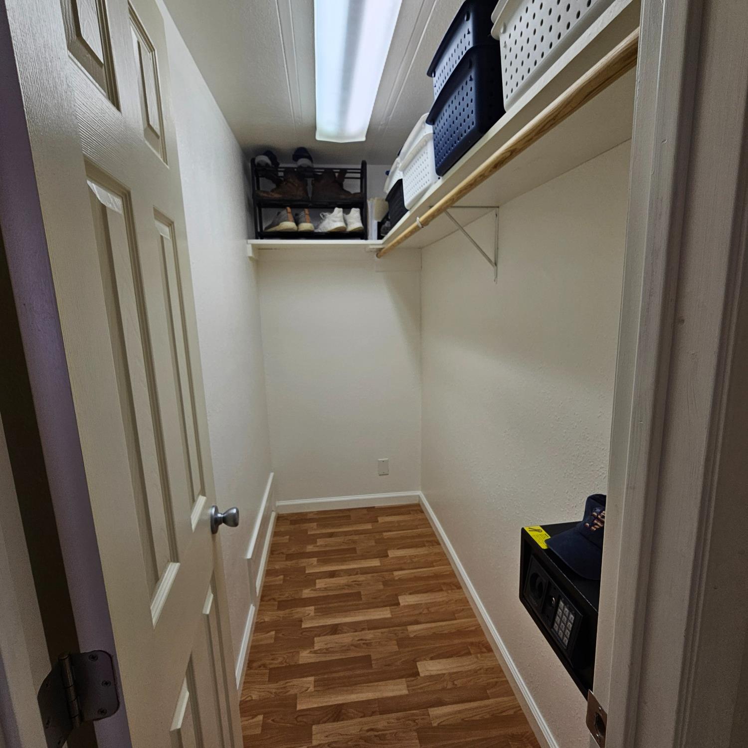 450 Gladycon Road, Unit 32 Colfax, CA 95713 - Photo 15 of 29 a view of a hallway with wooden floor and staircase