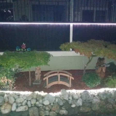 a view of a balcony with furniture