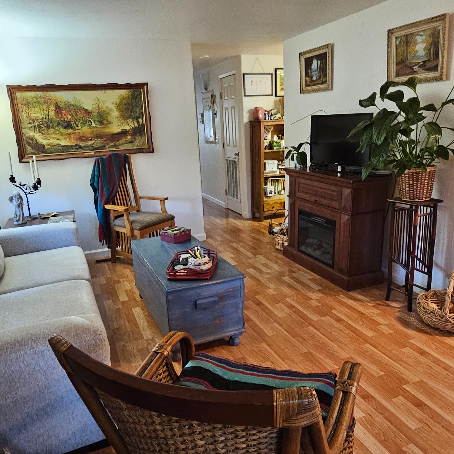 450 Gladycon Road, Unit 32 Colfax, CA 95713 - Photo 7 of 29 a living room with furniture a flat screen tv and a fireplace