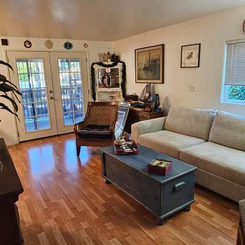 a kitchen with stainless steel appliances granite countertop a refrigerator and a stove