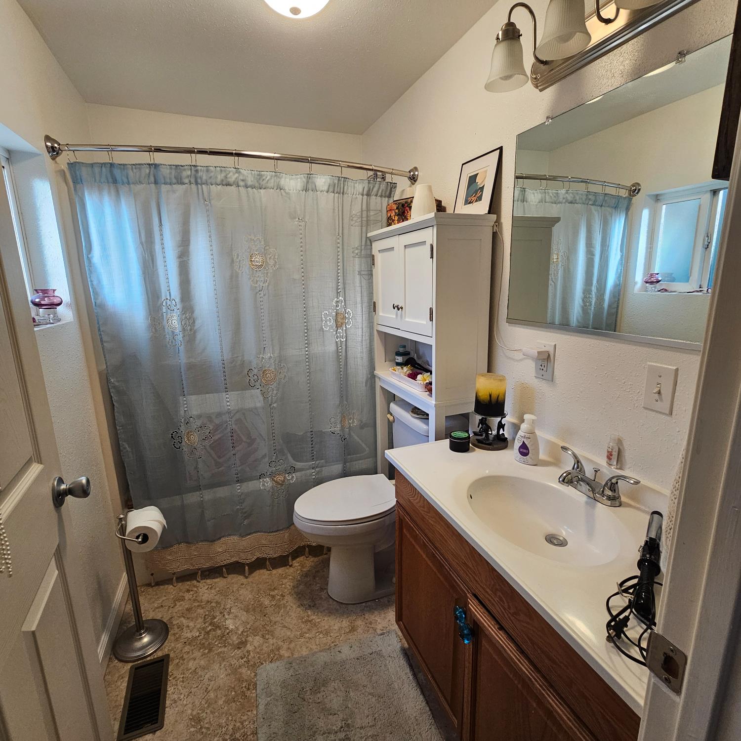 450 Gladycon Road, Unit 32 Colfax, CA 95713 - Photo 10 of 29 a bathroom with a sink toilet and shower