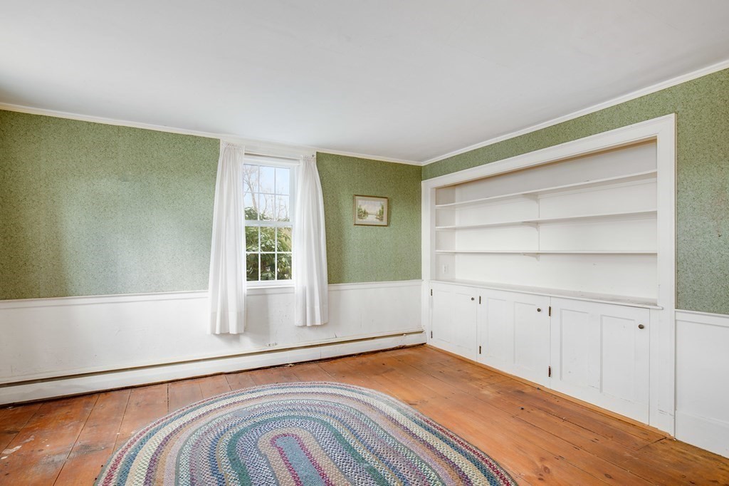 122 River Road Merrimac, MA 01860 - Photo 21 of 28 a view of a room with window and wooden floor