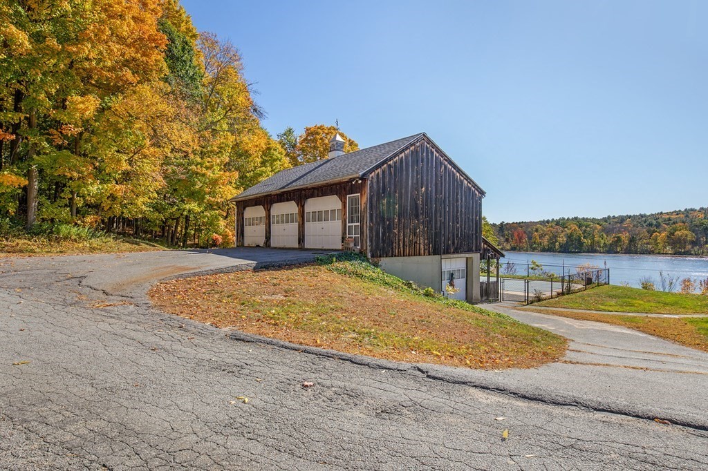 122 River Road Merrimac, MA 01860 - Photo 4 of 28 a view of a house with a swimming pool