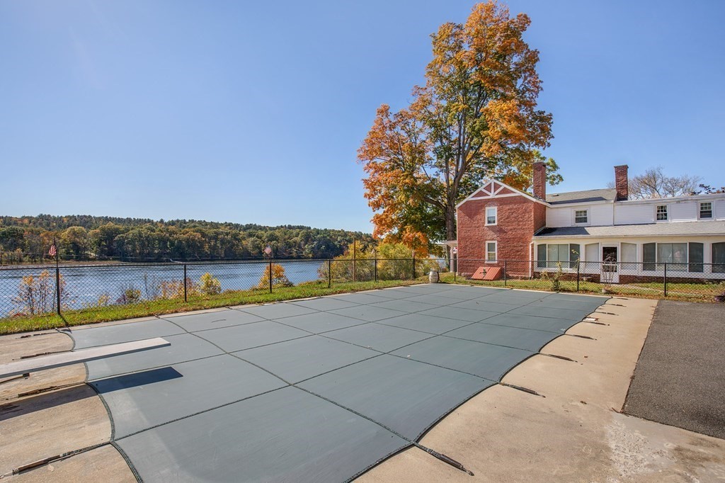 122 River Road Merrimac, MA 01860 - Photo 7 of 28 a view of swimming pool with outdoor seating and lake view