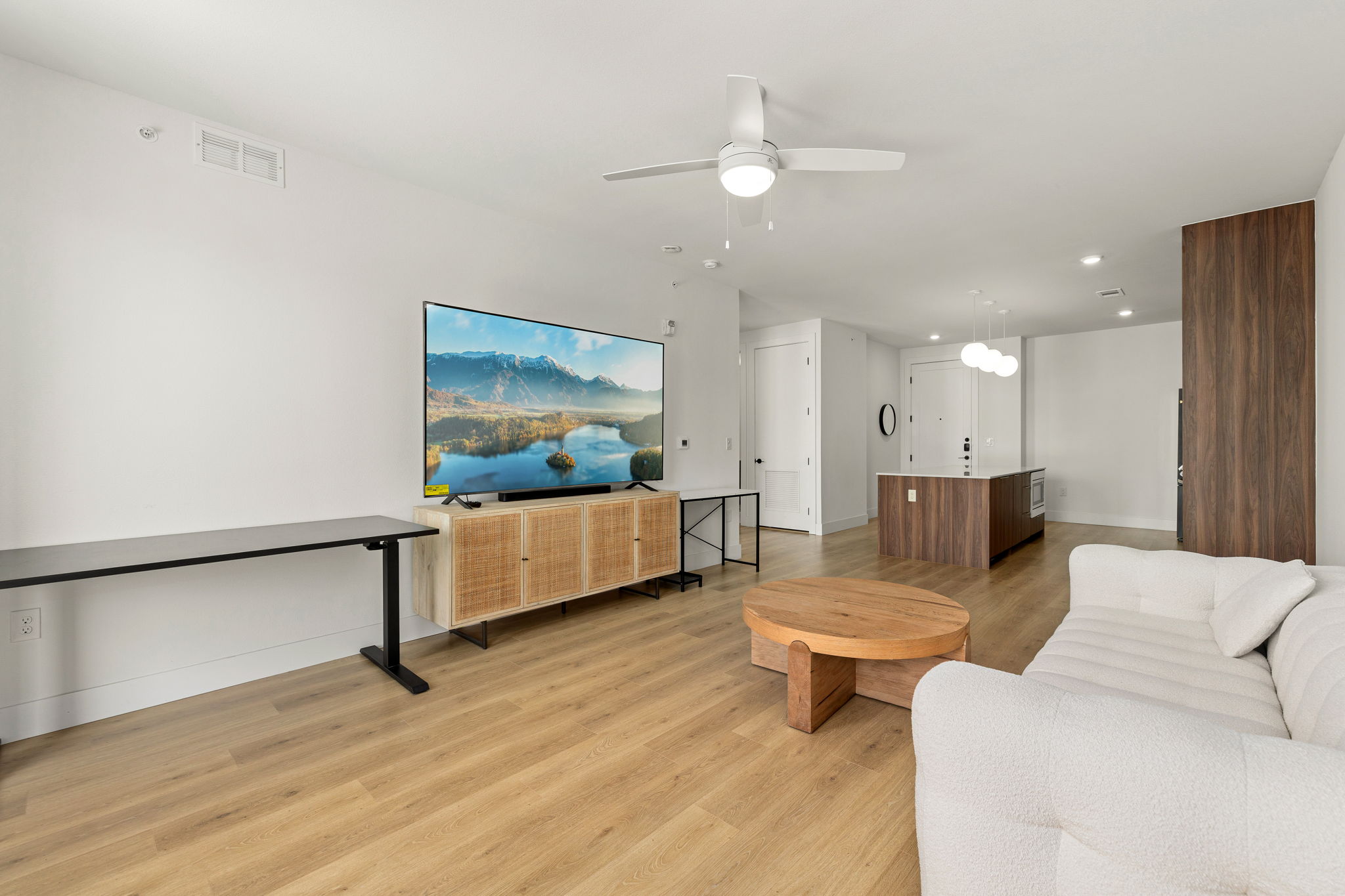1701 Simond Avenue, Unit 612 Austin, TX 78723 - Photo 5 of 40 a living room with furniture and a flat screen tv