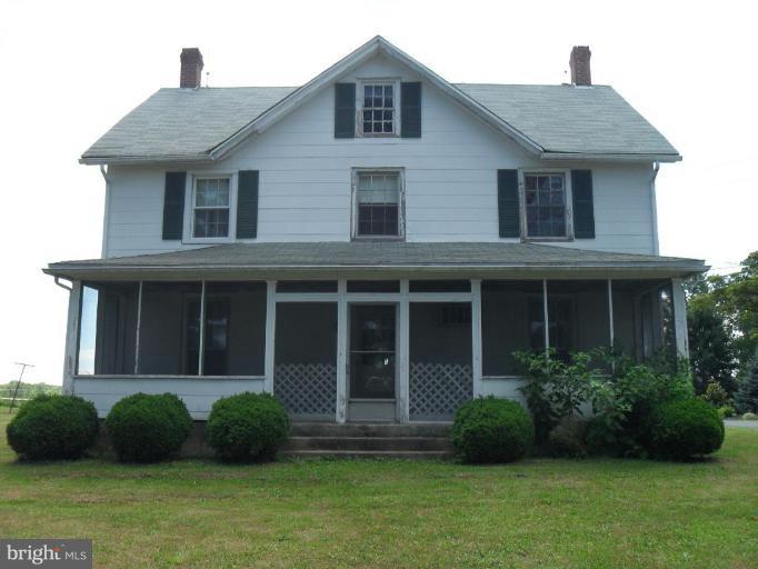 2019 Laurel Brook Road Fallston, MD 21047 - Photo 1 of 14 a front view of a house with a garden