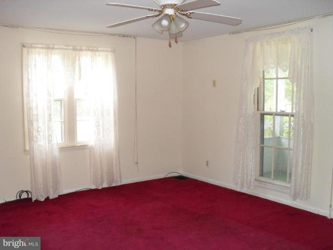 2019 Laurel Brook Road Fallston, MD 21047 - Photo 4 of 14 an empty room with windows and fan