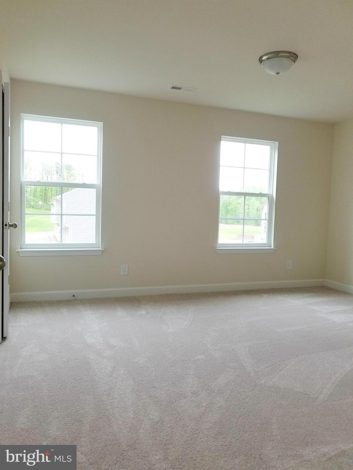 10312 Bluebird Court Spotsylvania, VA 22553 - Photo 16 of 20 an empty room with a window