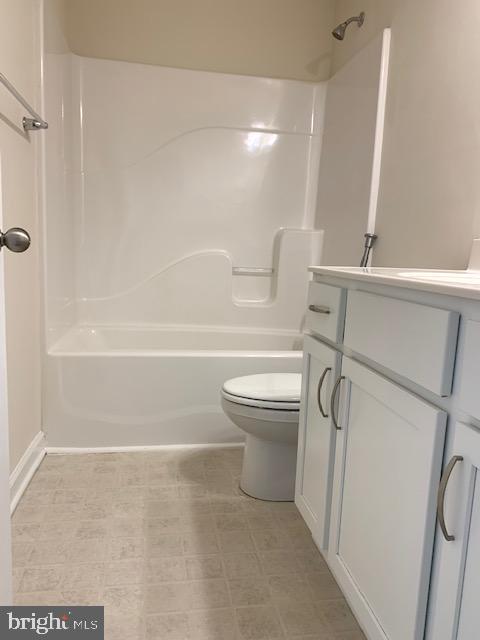 10312 Bluebird Court Spotsylvania, VA 22553 - Photo 17 of 20 a bathroom with a toilet and a shower
