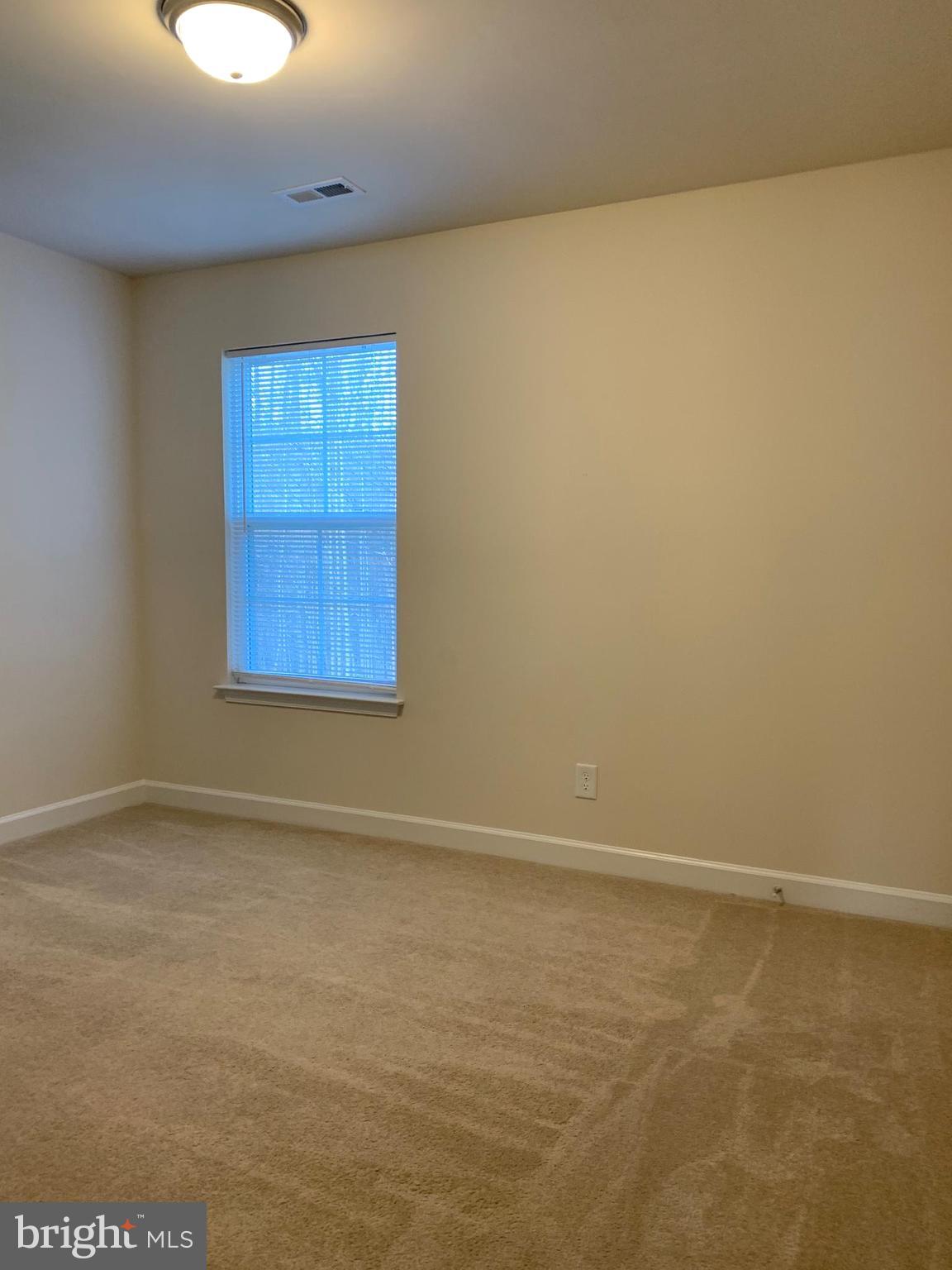 10312 Bluebird Court Spotsylvania, VA 22553 - Photo 19 of 20 an empty room with a window