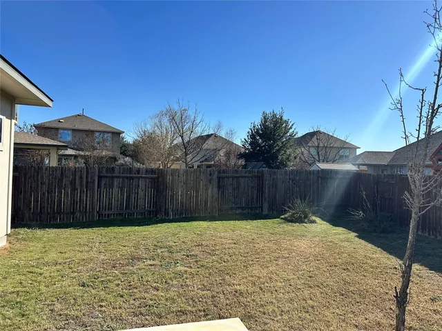 a bathroom with a double vanity sink toilet mirror and shower