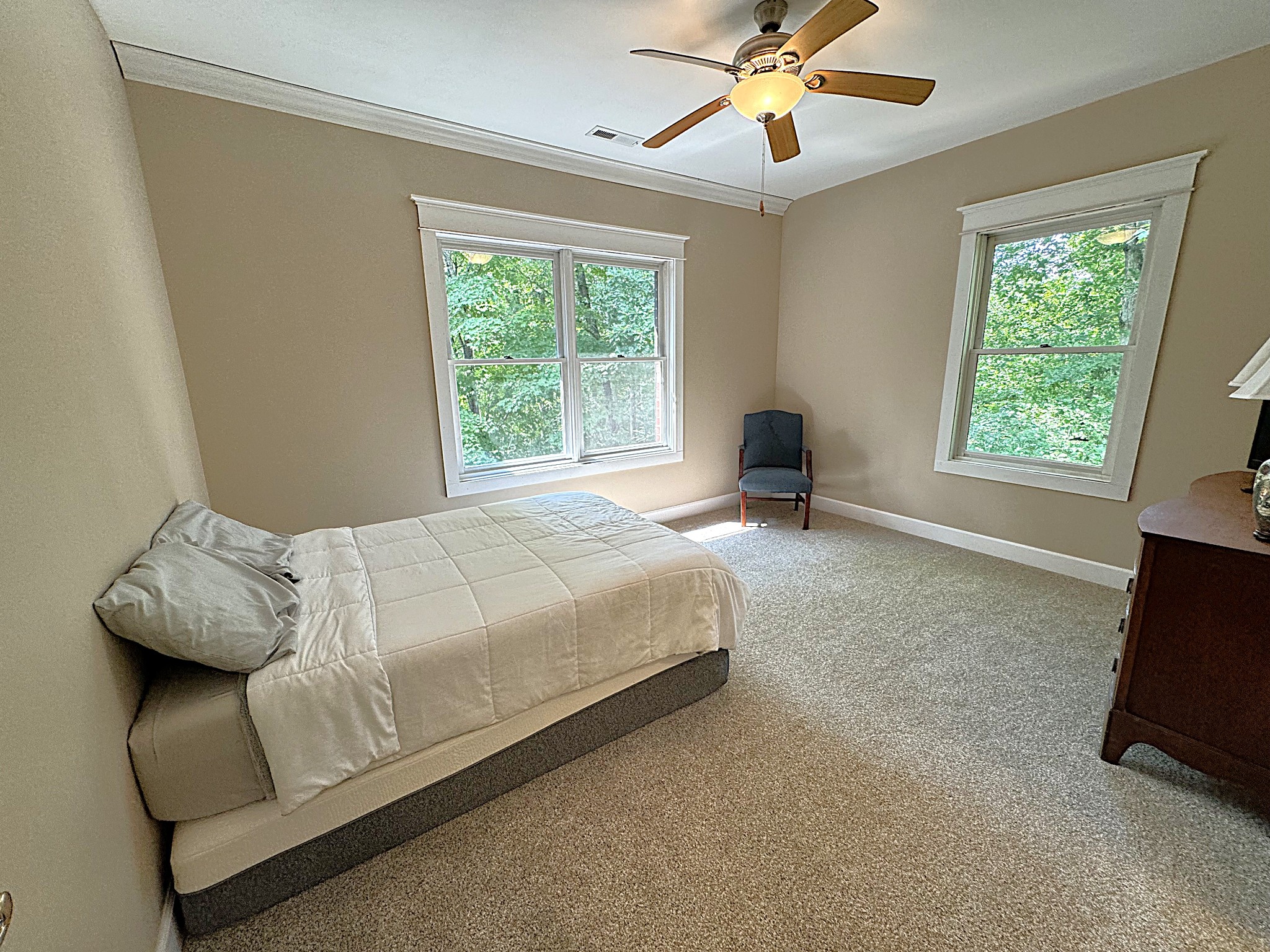 391 Fairview School Road Normandy, TN 37360 - Photo 49 of 68 a bedroom with a bed and a chandelier
